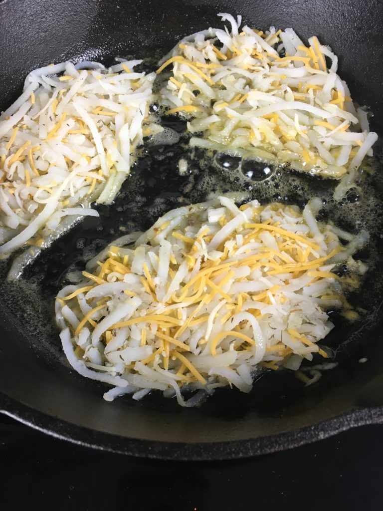 Crispy Cheesy Cast Iron Hash Browns
