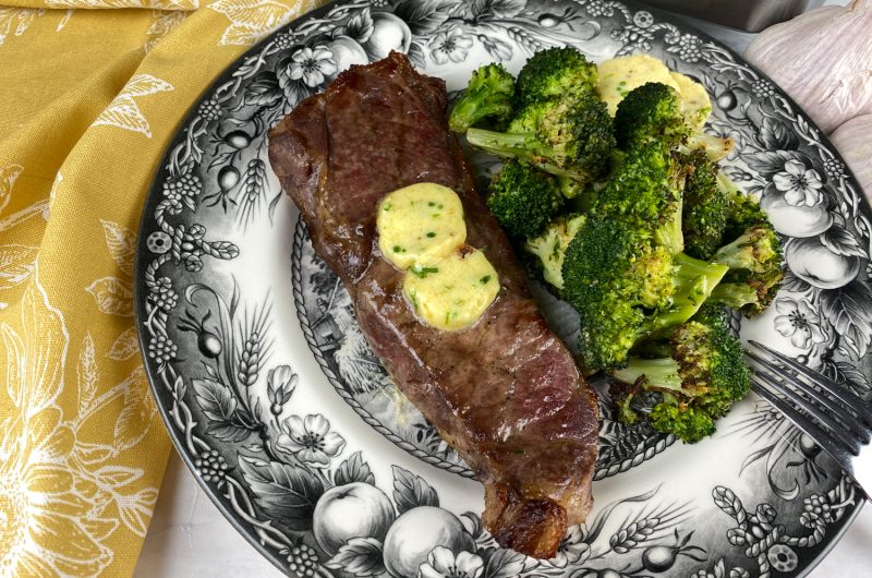 Air Fryer Strip Steak with Roasted Garlic Butter